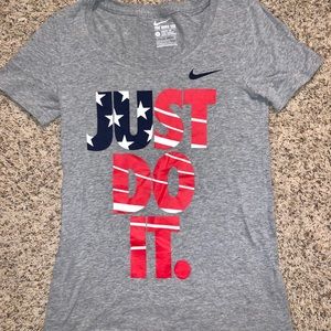 S Nike Just Do It Patriotic Tee. Athletic cut